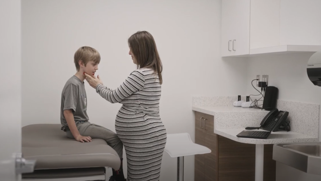 doctor examining patient