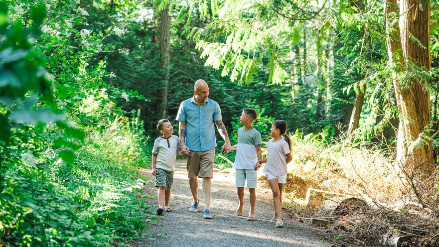 family on trail in latoria creek park