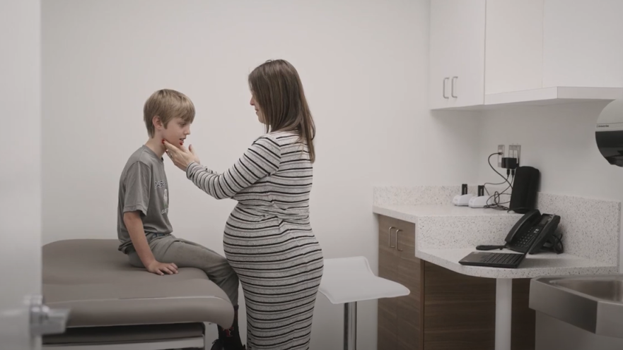 doctor examining patient