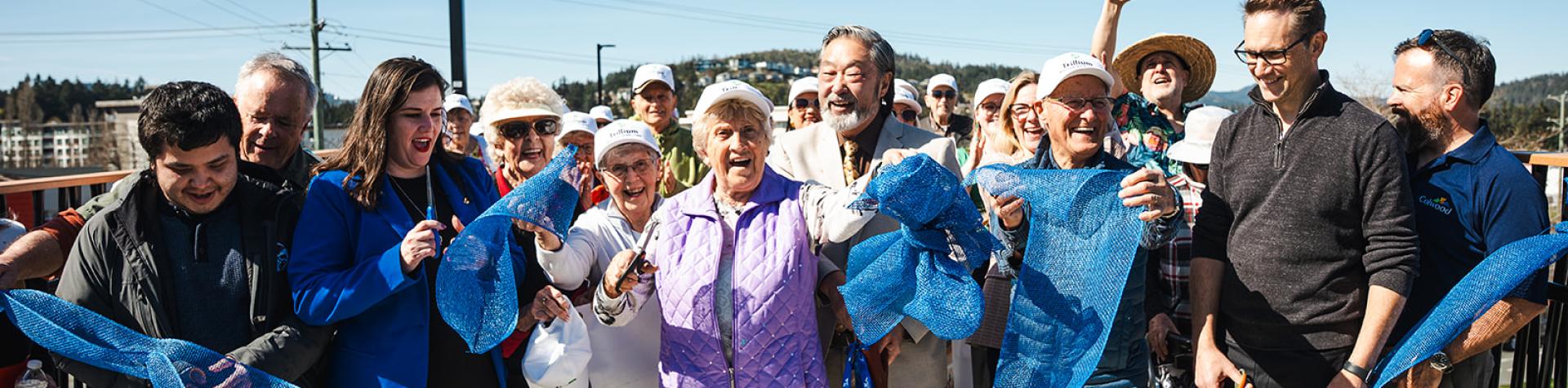 cutting the ribbon on the new galloping goose bridge