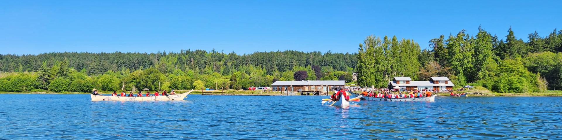 canoes on lagoon national indigenous peoples day