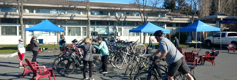 bikes on rack and people on bikes at bike tune up event at Colwood City Hall