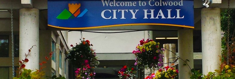 city hall entrance with flower baskets