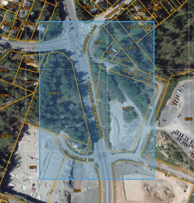 Aerial map highlighting a section of land bordered by Sooke Road, Veterans Memorial Parkway, Allandale Road, and Wildcat Trail. The highlighted area is shaded in blue, with surrounding lots and streets outlined in yellow.